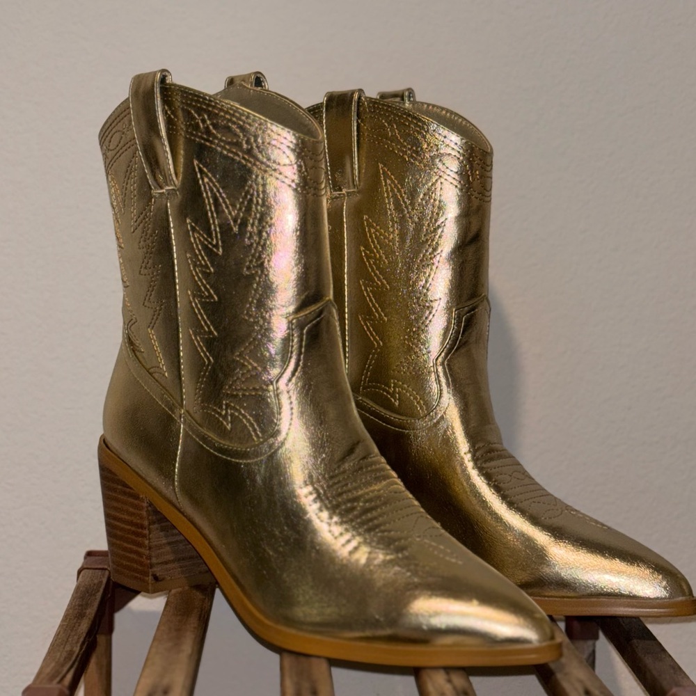 Never worn. Gold cowboy boots